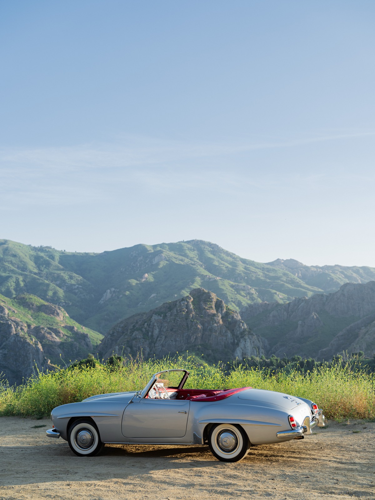 1959 Mercedes-Benz 190 SL rear three-quarter view in the Santa Monica Mountains above Malibu